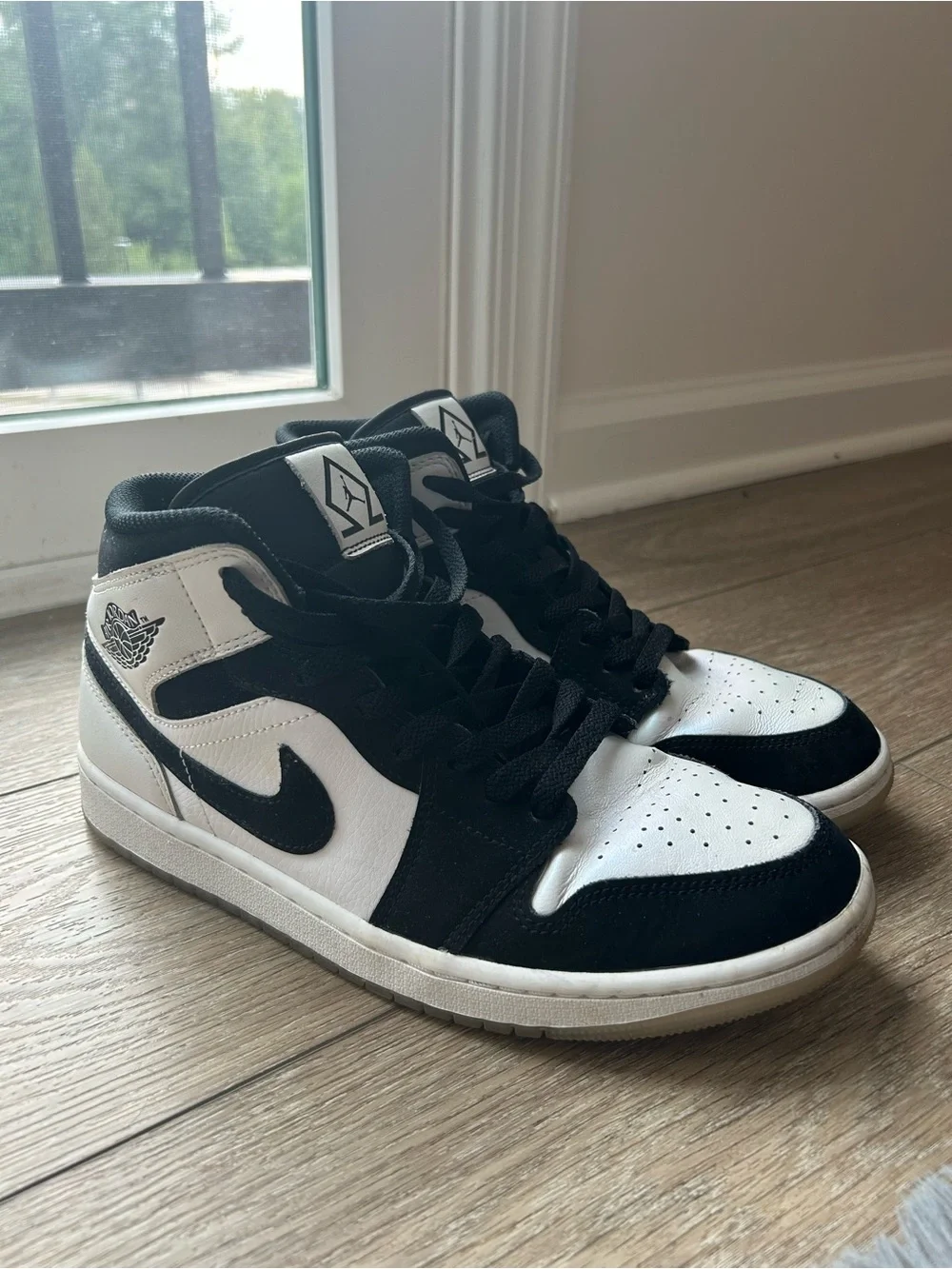 Nike Black and White Mid-Top Sneakers
